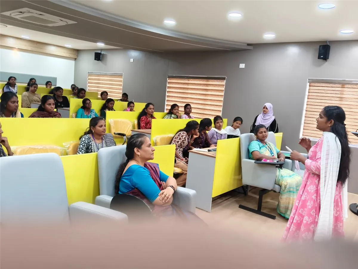 A student making her case to classmates and faculty in the smart classroom